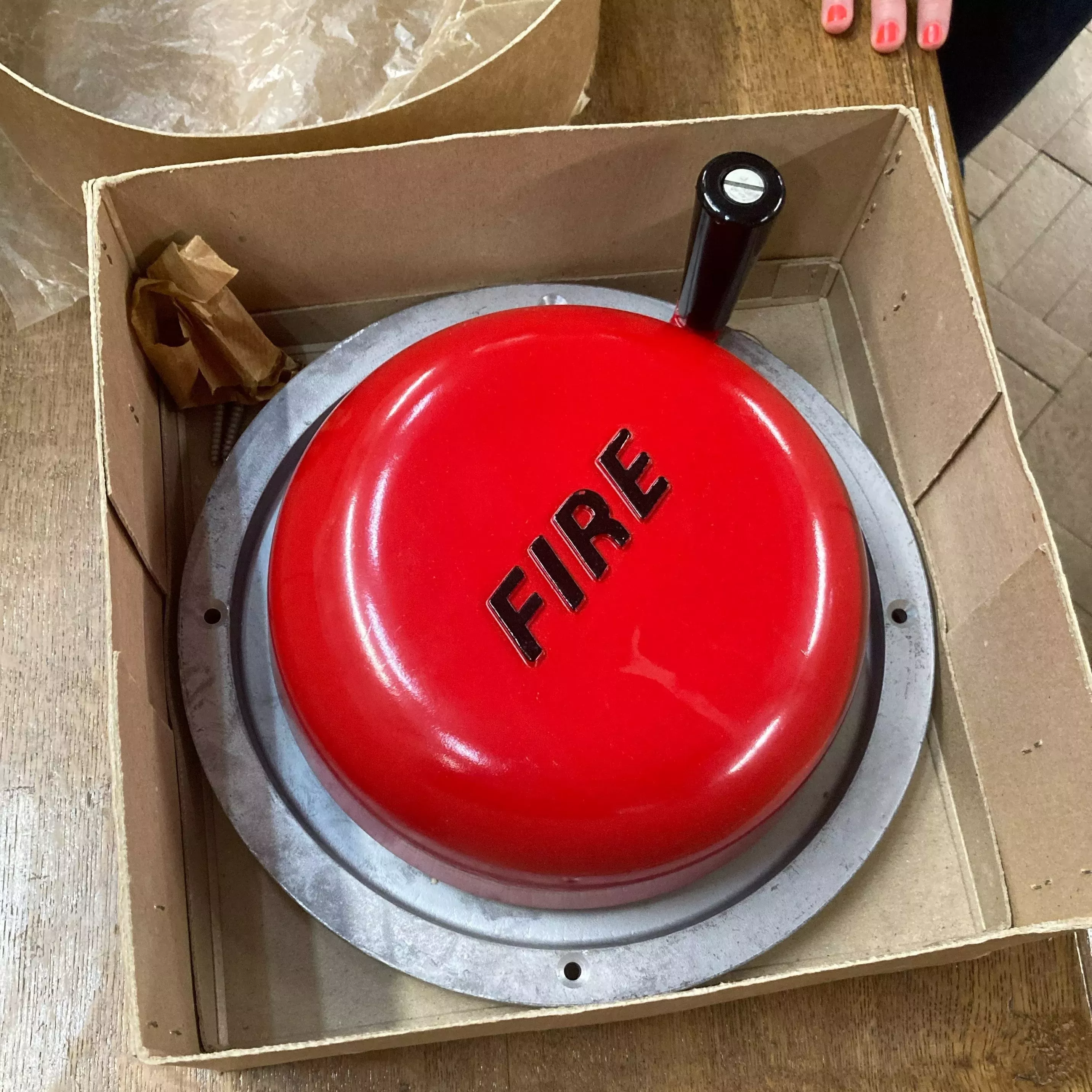 An old style fire alarm in a box