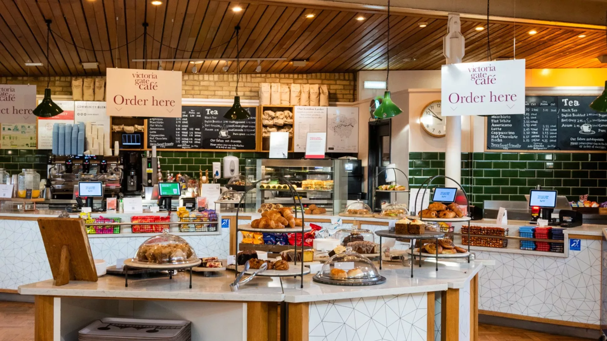 The Victoria Plaza Cafe at Kew Gardens stacked with food and serving counters